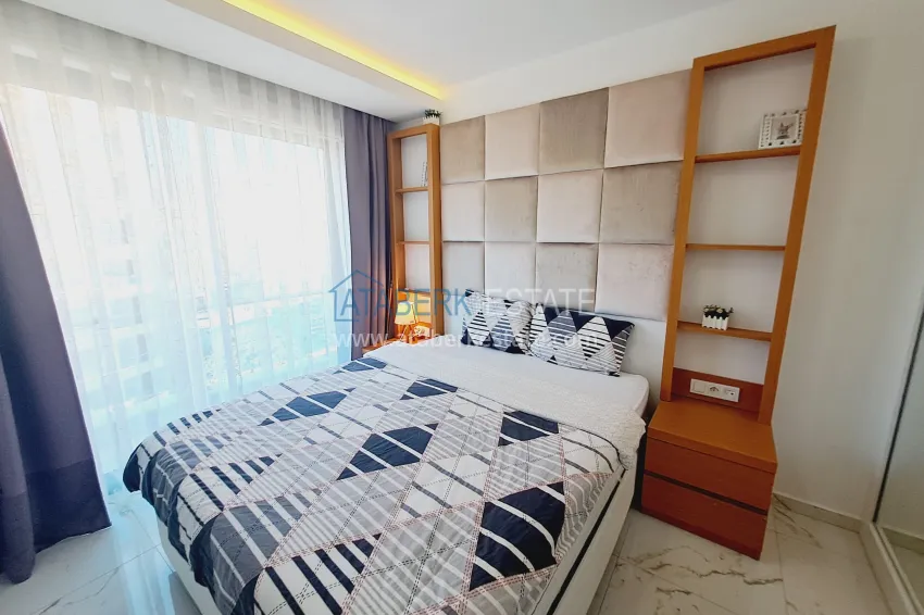 Purchase One bedroom apartment in the center of Alanya with furniture and access to a private beach 4