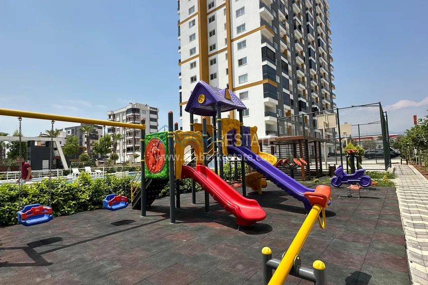 One bedroom apartment with new furniture, separate kitchen and 2 balconies in Mersin, Tomyuk 7