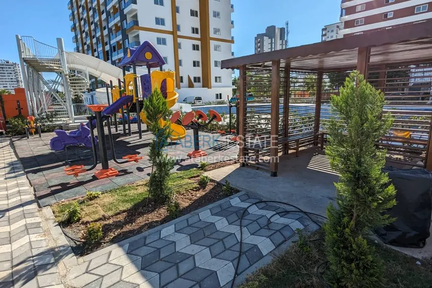 One bedroom apartment with new furniture, separate kitchen and 2 balconies in Mersin, Tomyuk 9