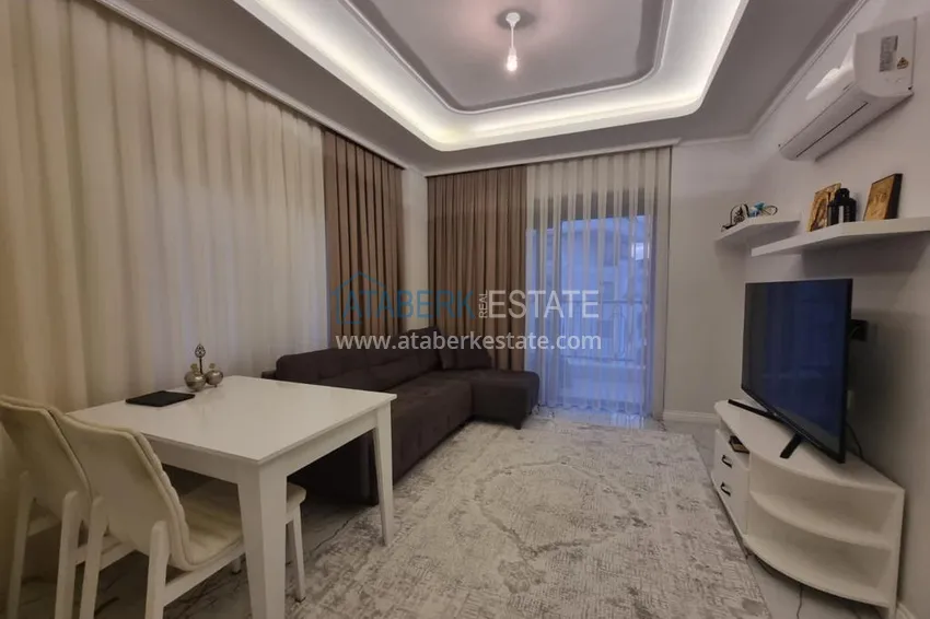 Purchase  Furnished three-room apartment in a prestigious area of Alanya, Oba 6 