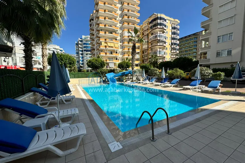 Apartment in Mahmutlar partially furnished with a glazed balcony and sea view 6 