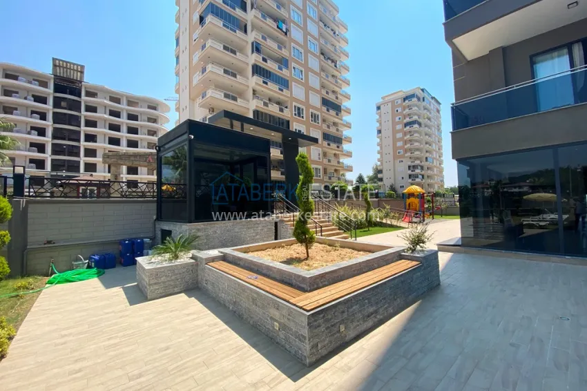 Three-room apartment in Mahmutlar, with a separate kitchen in a modern complex 6 