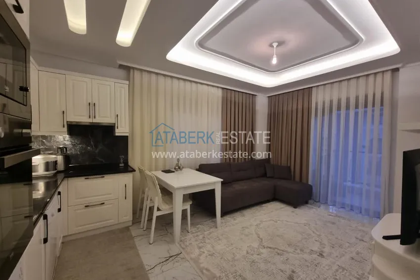 Purchase  Furnished three-room apartment in a prestigious area of Alanya, Oba 7 