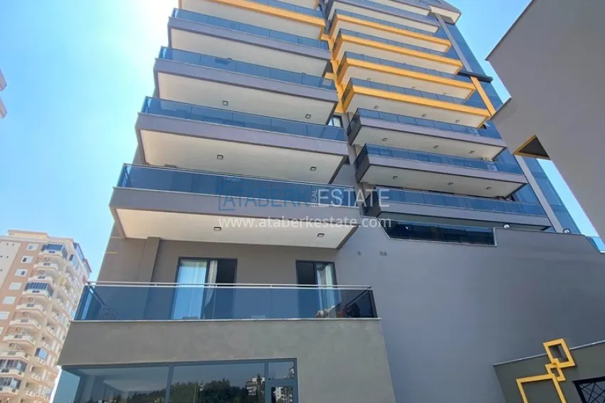 Three-room apartment in Mahmutlar, with a separate kitchen in a modern complex 7 