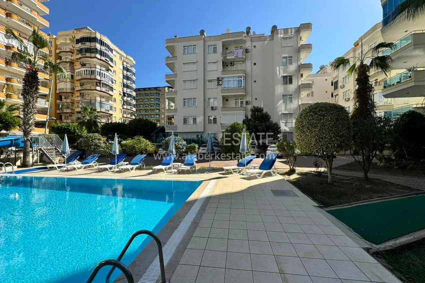 Apartment in Mahmutlar partially furnished with a glazed balcony and sea view 7 