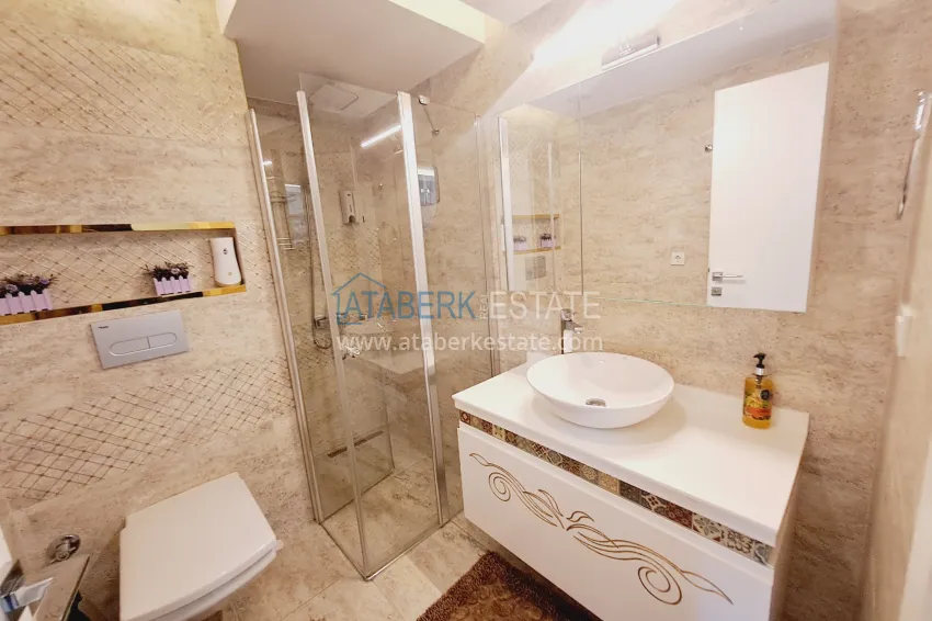Purchase One bedroom apartment in the center of Alanya with furniture and access to a private beach 7