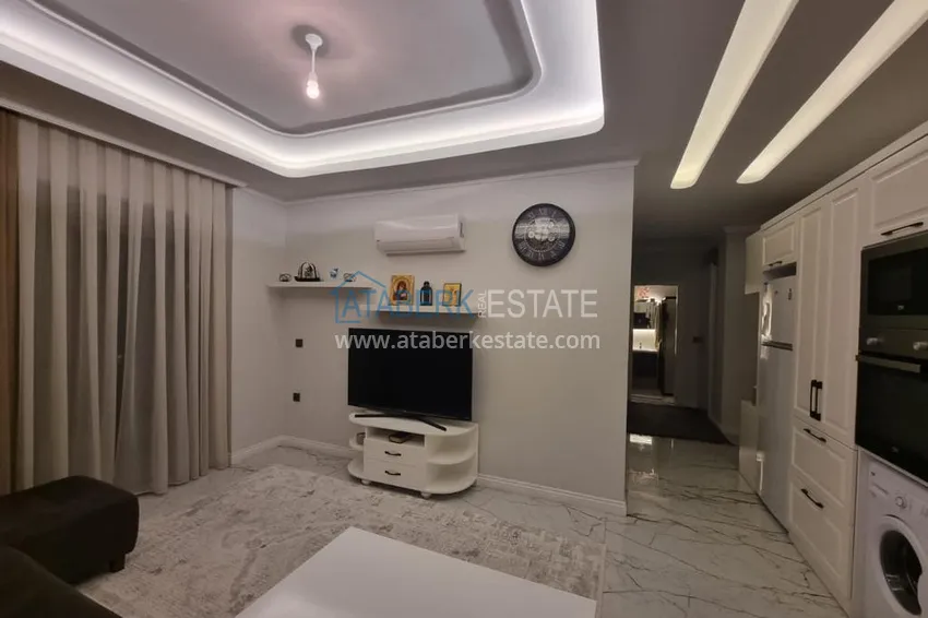 Purchase  Furnished three-room apartment in a prestigious area of Alanya, Oba 8 