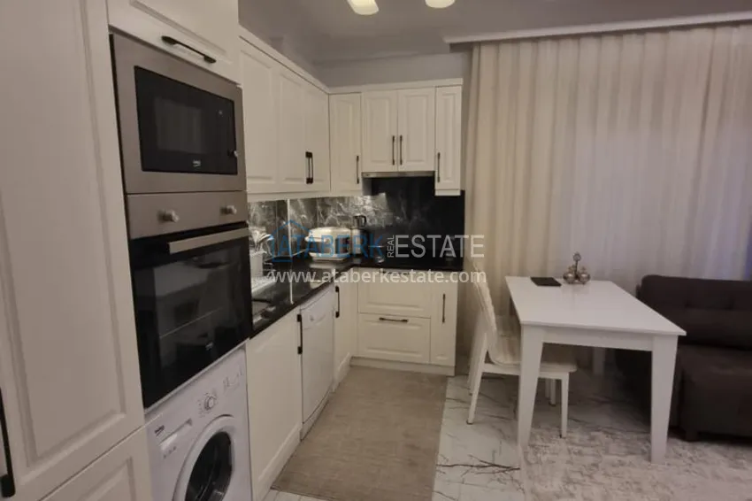 Purchase  Furnished three-room apartment in a prestigious area of Alanya, Oba 9 