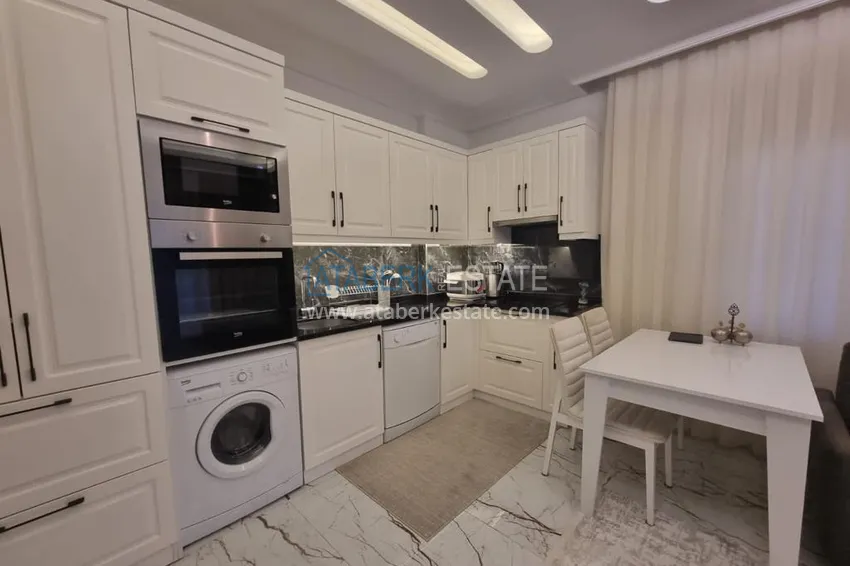 Purchase  Furnished three-room apartment in a prestigious area of Alanya, Oba 10 