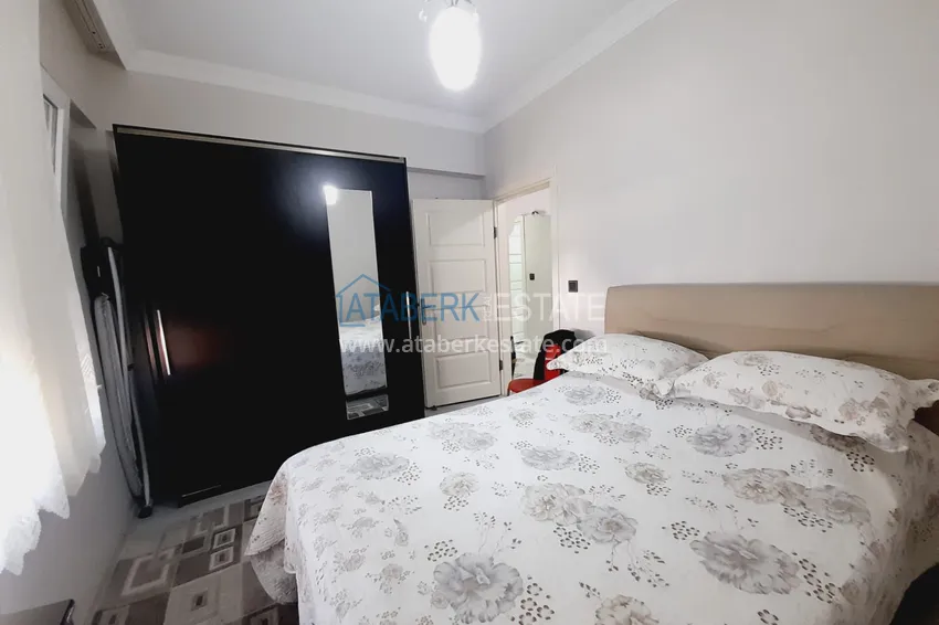 Purchase  Three-room apartment with separate kitchen and furniture in the center of Alanya	 10 