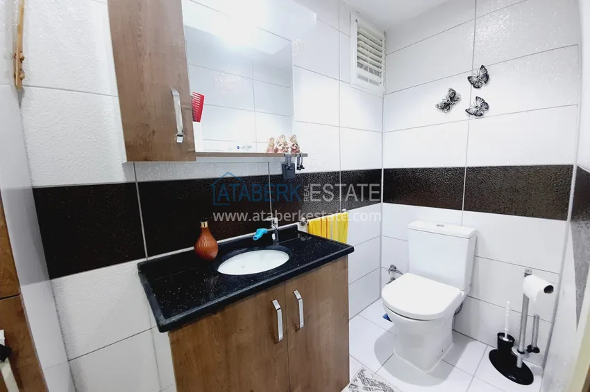 Purchase  Three-room apartment with separate kitchen and furniture in the center of Alanya	 12 