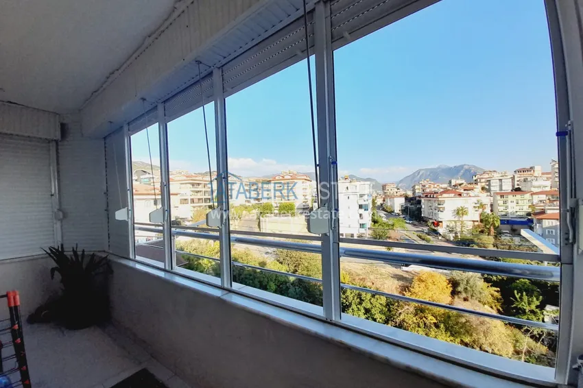Purchase  Three-room apartment with separate kitchen and furniture in the center of Alanya	 14 