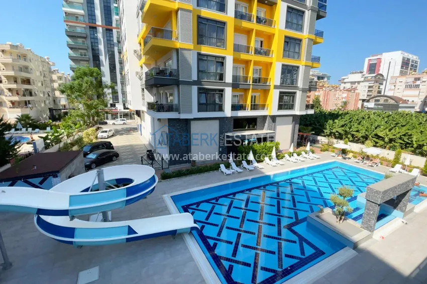 1+1 apartment in Mahmutlar with furniture and mountain views 2 