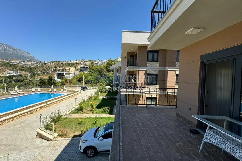 Purchase Semi-detached triplex villa in Kargicak area, furnished in a cottage complex 32 