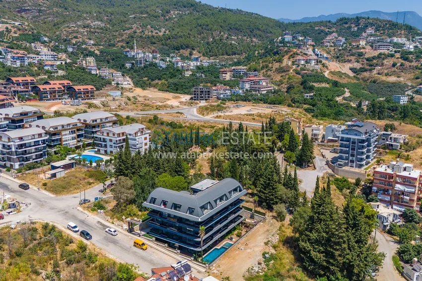Three-room apartment with access to the garden in a luxury complex — Alanya city center, Büyühasbahce district 5 