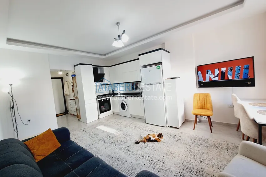 Purchase  Fully furnished apartment with a glazed balcony in the center of Mahmutlar at a bargain price 5 