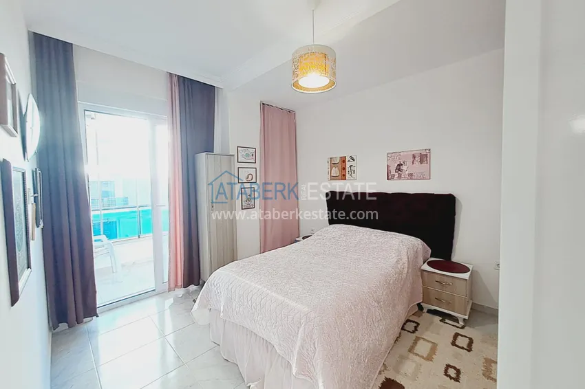 Purchase  Fully furnished apartment with a glazed balcony in the center of Mahmutlar at a bargain price 6 
