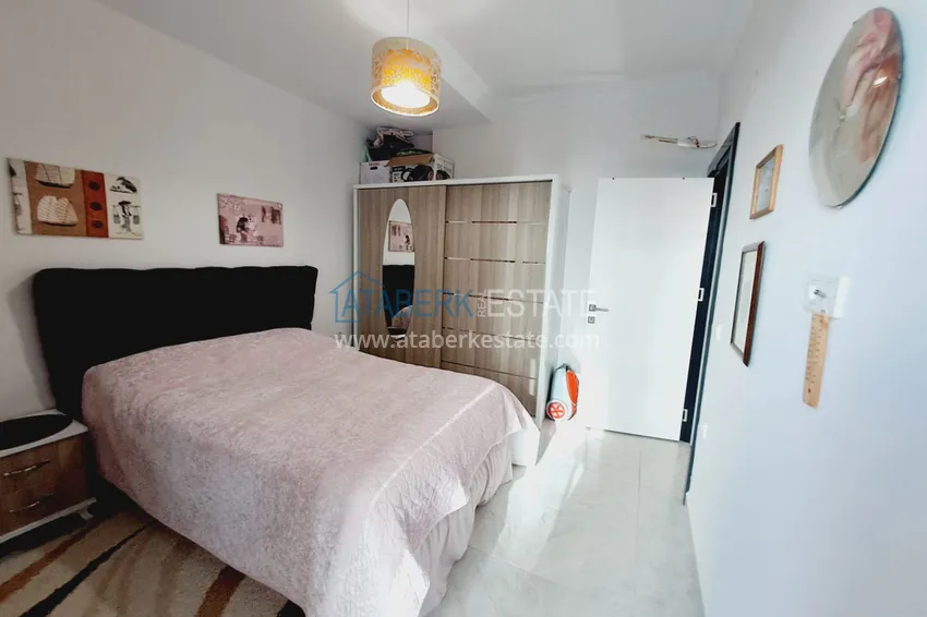 Purchase  Fully furnished apartment with a glazed balcony in the center of Mahmutlar at a bargain price 7 