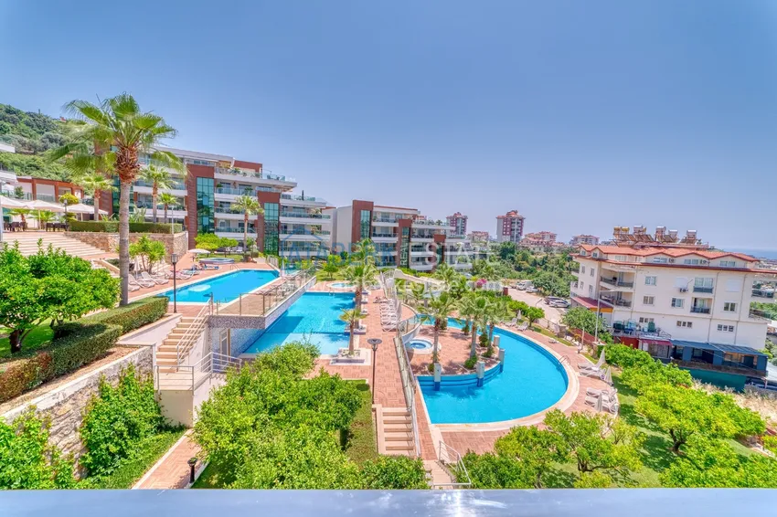 Two-bedroom apartment with furniture and panoramic views in Cikcilli Alanya 2 