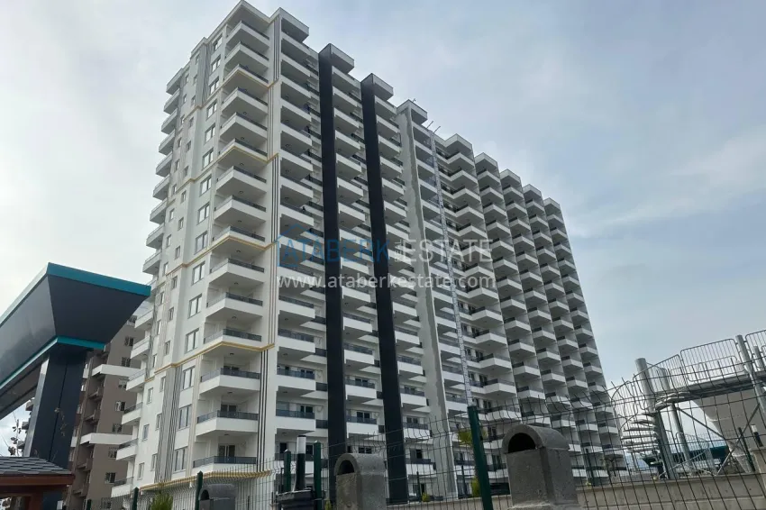 Finished one-bedroom apartments in a new complex with infrastructure — Tomyuk, Mersin 1