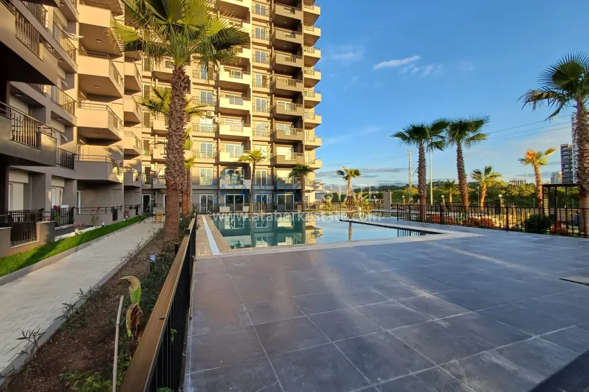 Apartments 1 + 1 in a complex under construction with infrastructure in Cesmeli-Mersin 2 