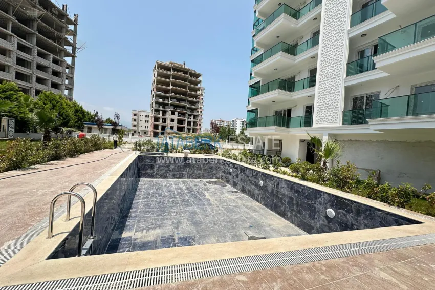 One bedroom apartment in a new complex 150 meters from the sea — Mersin, Tomyuk 3
