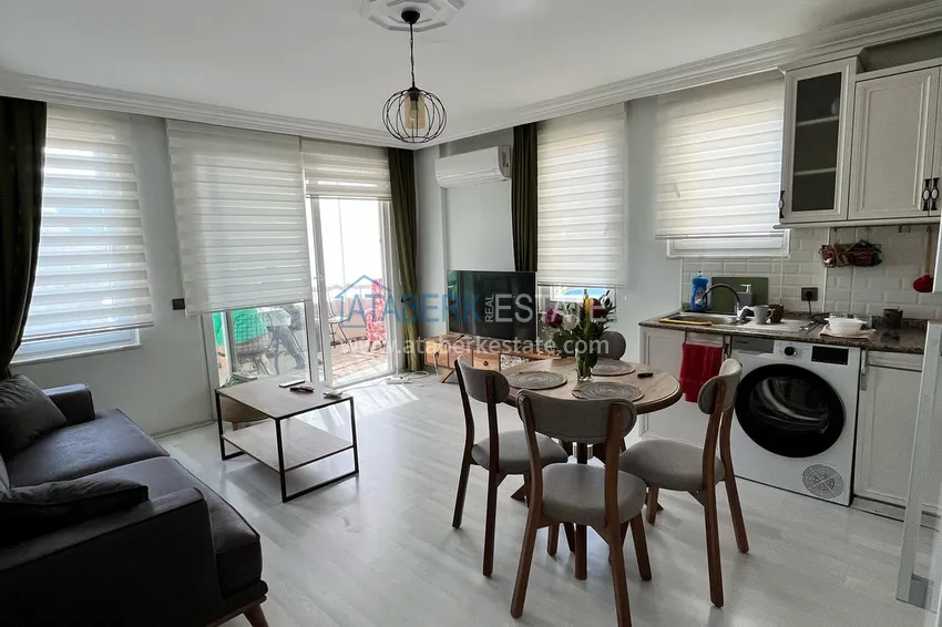 Purchase  1+1 apartment of 72 m2 in the center of Alanya with new furniture and two balconies - Cleopatra beach area 5 