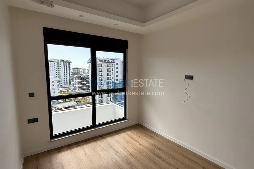 Purchase  Modern two-bedroom apartment with mountain views in a hotel-level residential complex, Mahmutlar - Alanya 12 