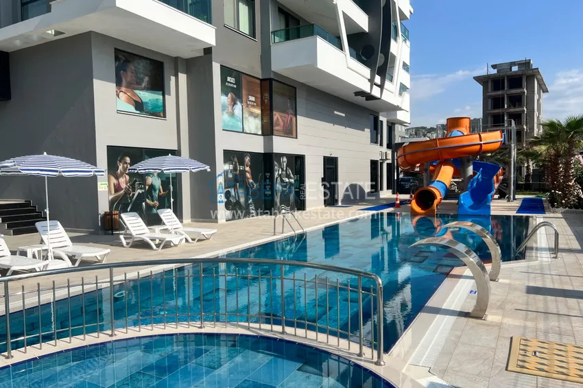 2+1 apartment in a new residential complex with a private beach. Kargicak District, Alanya 12 
