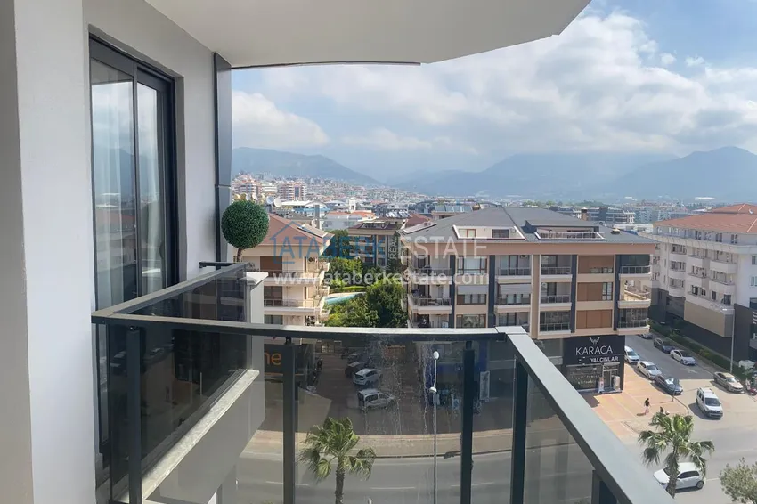 Purchase 1+1 apartment for rent in Alanya, Oba district center No. 31 14 