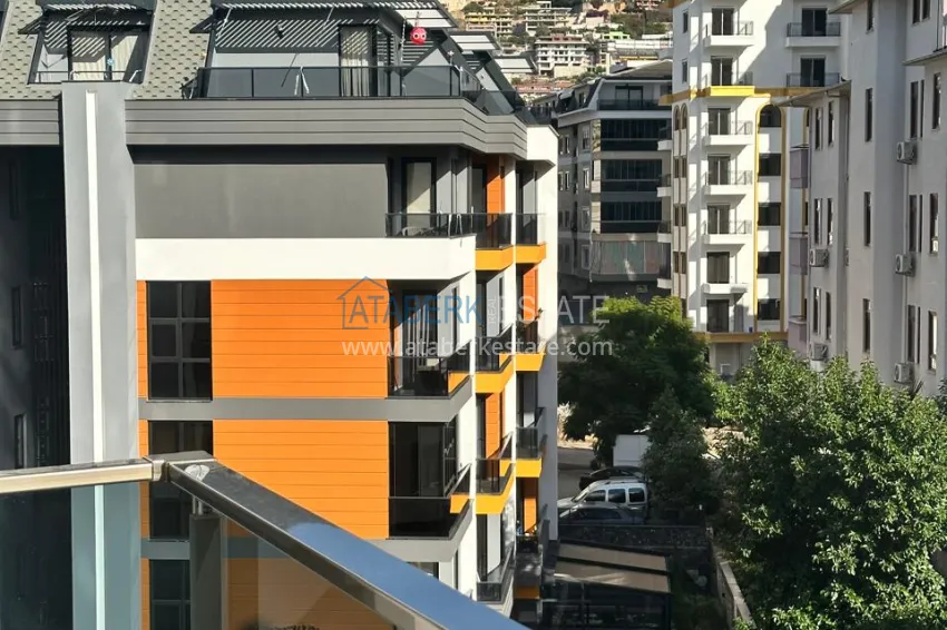 Purchase 2+1 apartment with furniture, separate kitchen and mountain views - Alanya Center 14