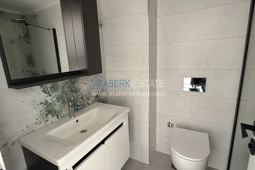 Purchase  Modern two-bedroom apartment with mountain views in a hotel-level residential complex, Mahmutlar - Alanya 15 