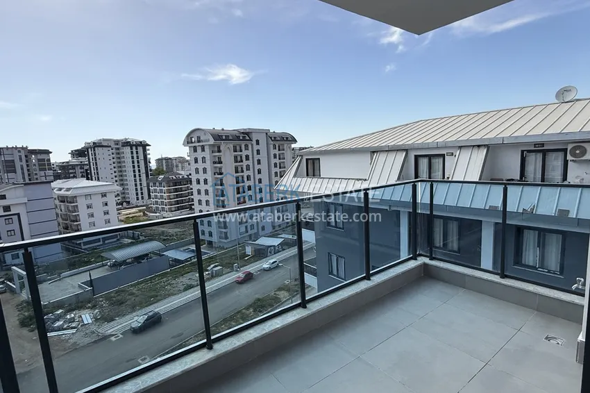 Purchase  Modern two-bedroom apartment with mountain views in a hotel-level residential complex, Mahmutlar - Alanya 19 