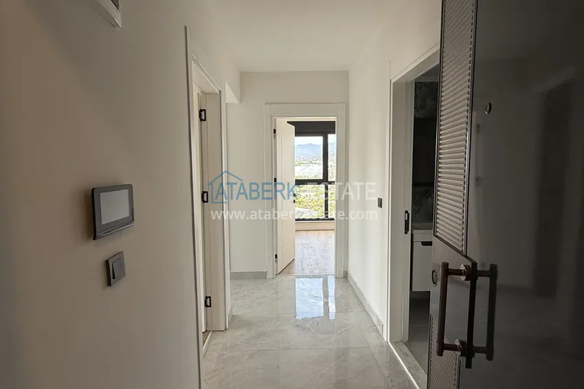 Purchase  Modern two-bedroom apartment with mountain views in a hotel-level residential complex, Mahmutlar - Alanya 1 