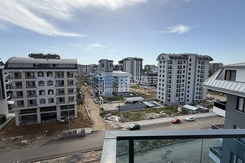 Purchase  Modern two-bedroom apartment with mountain views in a hotel-level residential complex, Mahmutlar - Alanya 21 