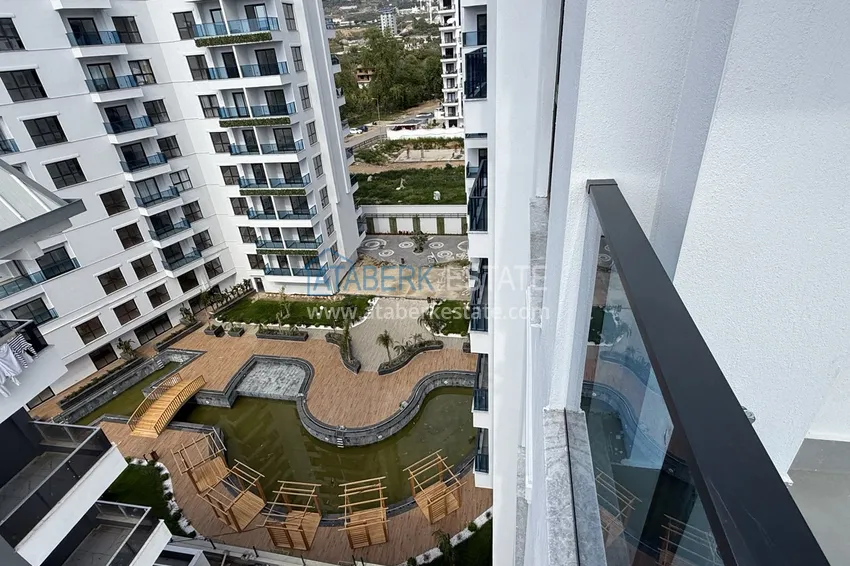 Purchase  Modern two-bedroom apartment with mountain views in a hotel-level residential complex, Mahmutlar - Alanya 23 