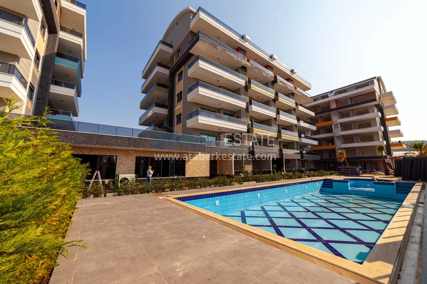 Furnished 2+1 garden duplexes in a complex with infrastructure, Kargicak 4 