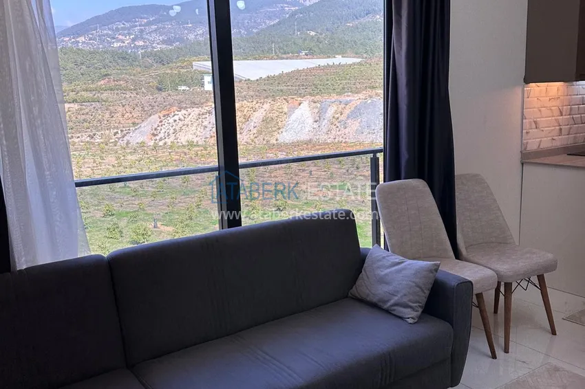 Purchase 1+1 apartment with new furniture and a glazed balcony in a new building — Alanya, Upper Oba district 5 