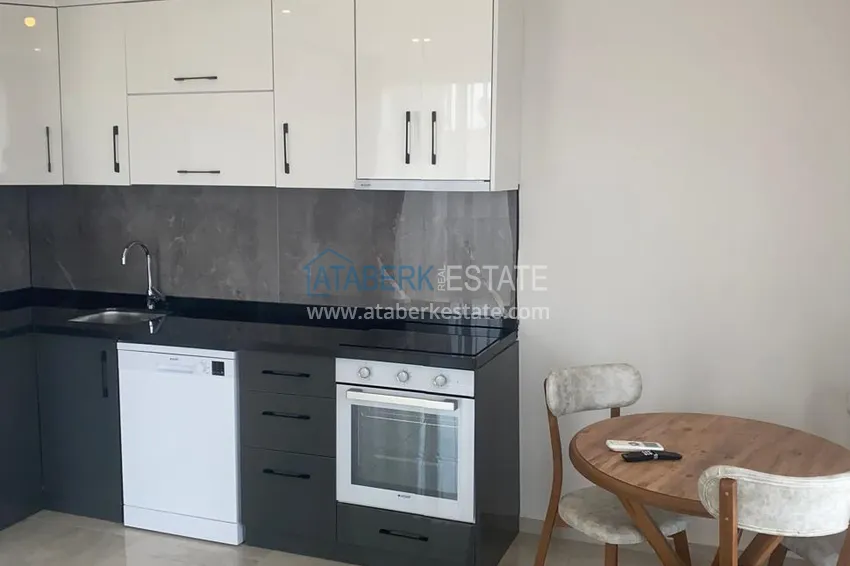 Purchase 1+1 apartment for rent in Alanya, Oba district center No. 31 7 
