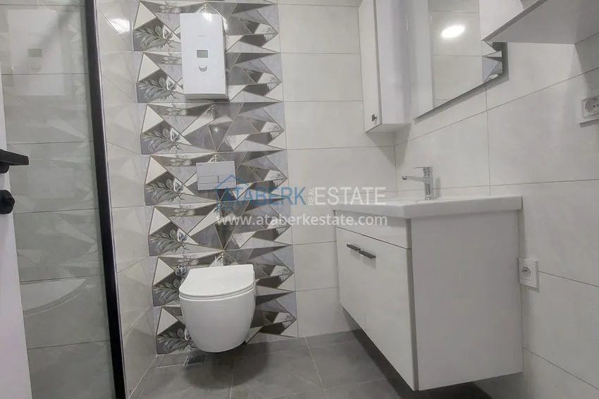 Purchase Cozy 1+1 apartment in the center of Mahmutlar, just 550 meters from the sea 14 