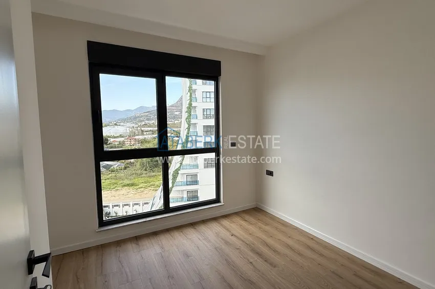 Purchase  Modern two-bedroom apartment with mountain views in a hotel-level residential complex, Mahmutlar - Alanya 7 