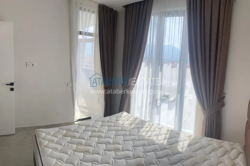 Purchase 1+1 apartment for rent in Alanya, Oba district center No. 31 10 