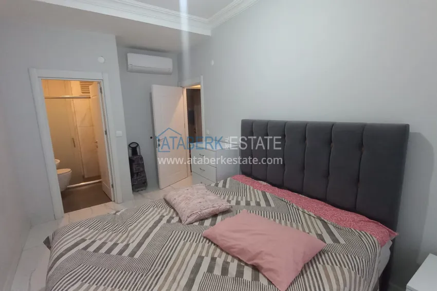 Purchase  Three-room city apartment with furniture and a separate kitchen in the center of Alanya  10 