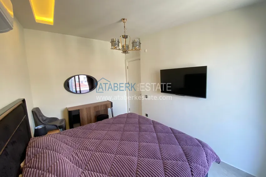 Purchase  Panoramic 2+1 duplex with furniture in the very center of Alanya — Suitable for short-term rent  12 