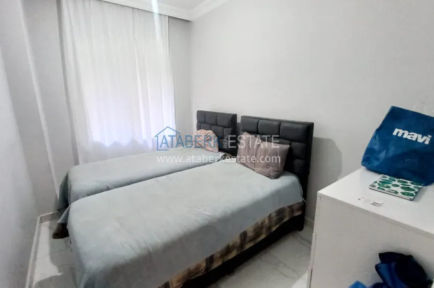 Purchase  Three-room city apartment with furniture and a separate kitchen in the center of Alanya  13 