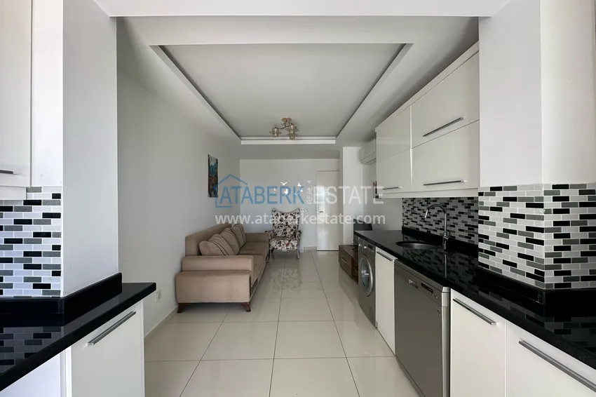 Purchase  1+1 apartment with furniture and sea view in the center of Alanya - Cleopatra beach area  6 