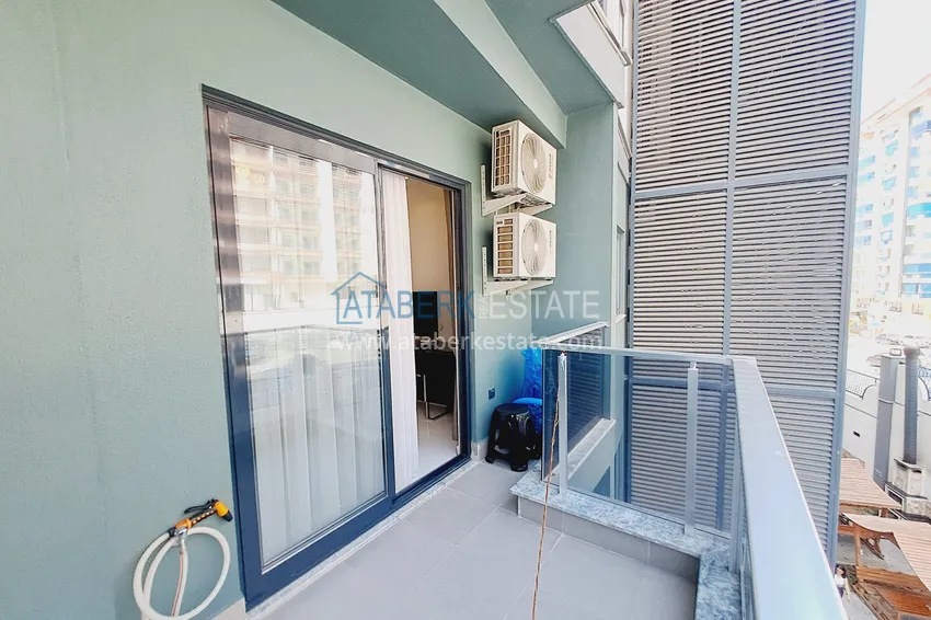 Purchase  Stylish apartment 1+1 with new furniture in a complex with hotel infrastructure - Alanya, Mahmutlar 10 