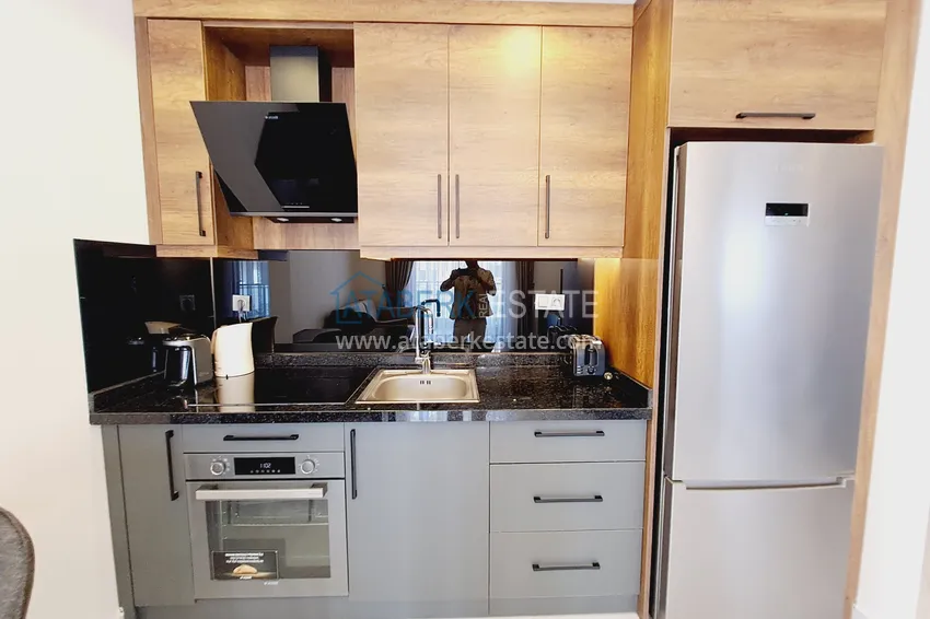 Purchase  Stylish apartment 1+1 with new furniture in a complex with hotel infrastructure - Alanya, Mahmutlar 2 