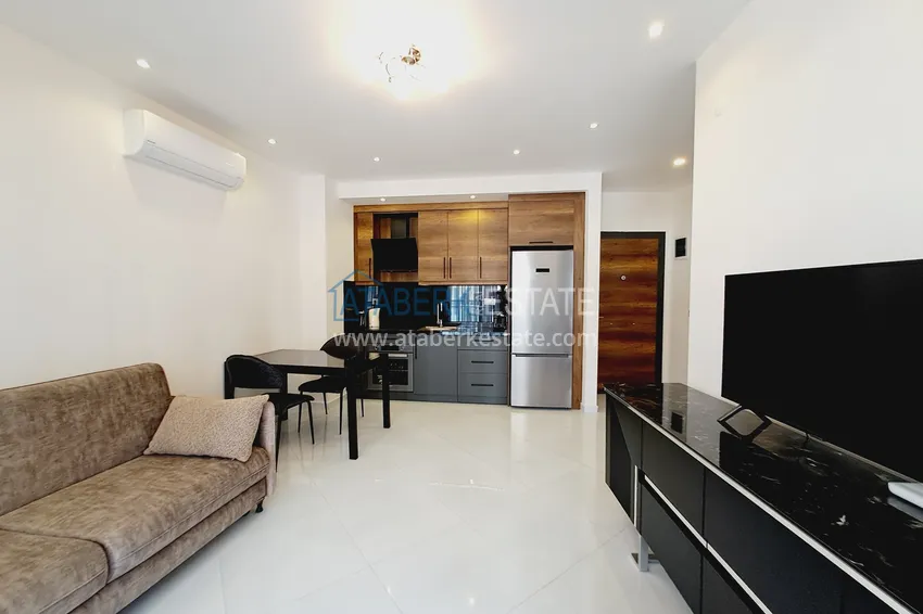 Purchase  Stylish apartment 1+1 with new furniture in a complex with hotel infrastructure - Alanya, Mahmutlar 3 