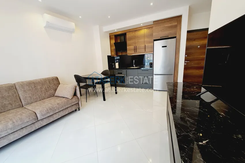 Purchase  Stylish apartment 1+1 with new furniture in a complex with hotel infrastructure - Alanya, Mahmutlar 4 